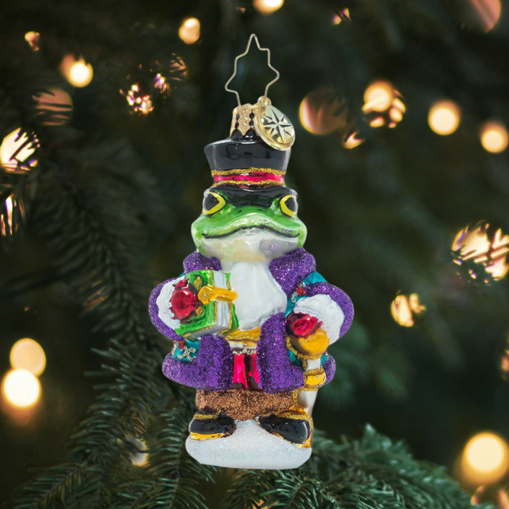 Ornament Description - One Academic Amphibian Gem: This brainy bullfrog is looking toad-ally dapper in his top hat and coat. He's as smart as he is stylish!