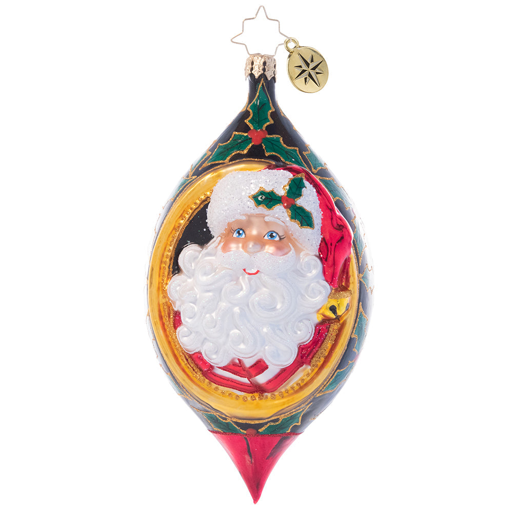 Front - Ornament Description - Holly Jolly Christmas: 'Tis the season! Jolly old Saint Nick smiles from within this intricate drop ornament adorned with festive holly leaves and berries.