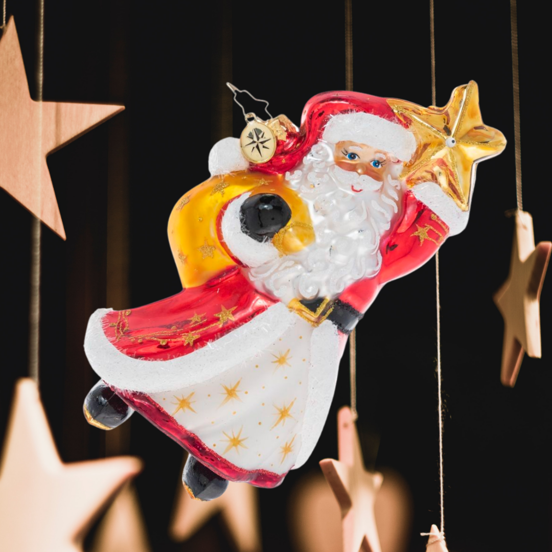 Ornament Description - Star Bright Santa: We've always known he had star power! Santa holds a twinkling star and makes a Christmas wish for a bright and joyous holiday season for all.
