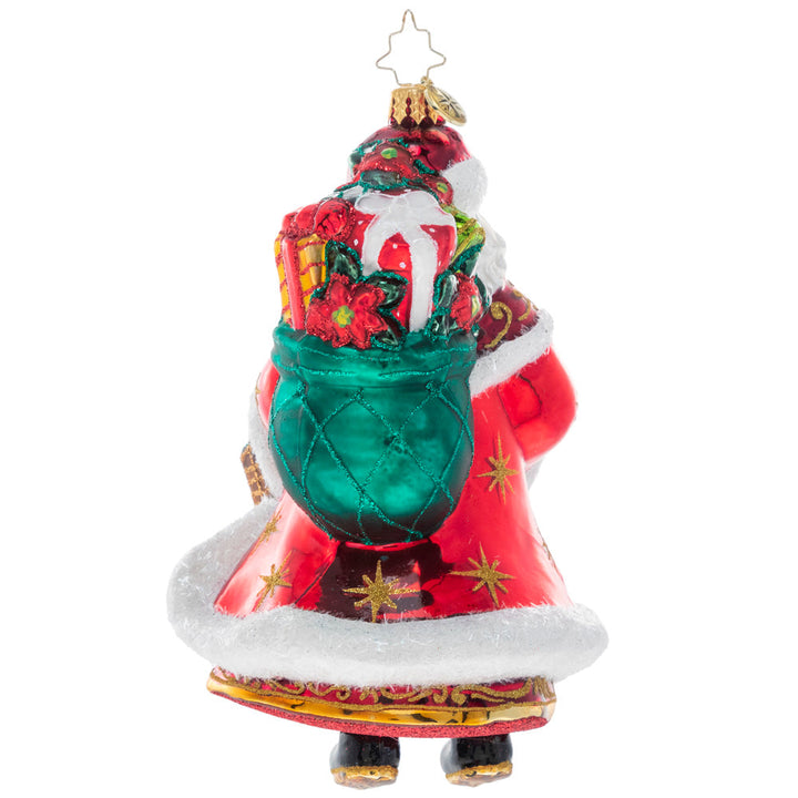 Back - Ornament Description - Festive Florals Santa: With a gift basket of Christmas poinsettias and decorated robes to match, Santa is heading to a fancy holiday party. His golden staff will help light the way through the snow.