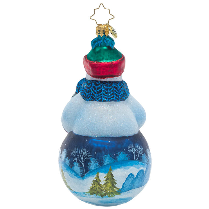 Back - Ornament Description - Winter's Snowy Scene: Mr. Snowman is dressed for the weather in his favorite wintertime accessories that allow him to show off the snow-covered countryside landscape painted on his belly. Bundle up, buddy!