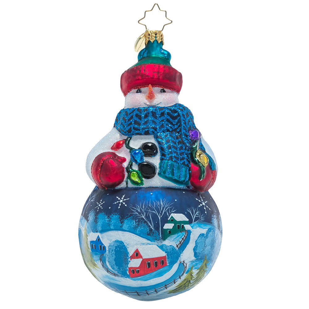 Front - Ornament Description - Winter's Snowy Scene: Mr. Snowman is dressed for the weather in his favorite wintertime accessories that allow him to show off the snow-covered countryside landscape painted on his belly. Bundle up, buddy!