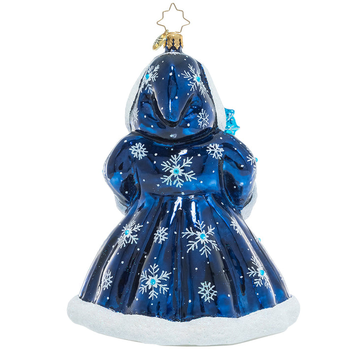 Back - Ornament Description - A Winter Dream: Celebrating all the splendor of a frosty winter's night, Saint Nicholas dons his luxurious icy blue robes with plenty of snowy sparkle. Let it snow, let it snow, let it snow! This special ornament has been hand-picked by the Radko team to be part of the Limited Edition collection.