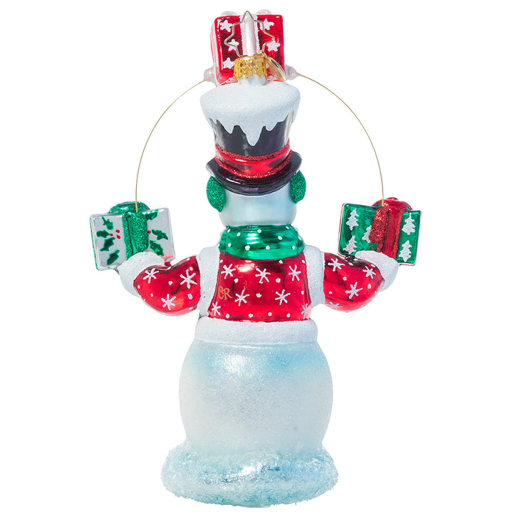 Back - Ornament Description - Gift Juggling Juggler: Mr. Snowman is used to being extra busy during the holiday season-- good thing he's an expert juggler! He's dressed in his festive finest to deliver gifts and spread Christmas cheer all over town.