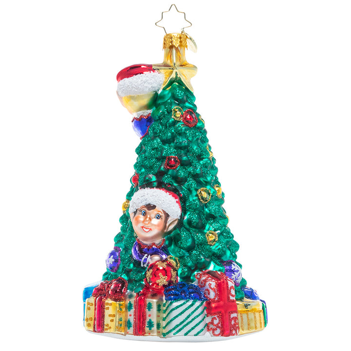 Back - Ornament Description - Three Tree Trimmers: They don't call them Santa's helpers for nothing! These busy elves are hard at work making sure the North Pole workshop tree is trimmed perfectly to Santa's high standards.