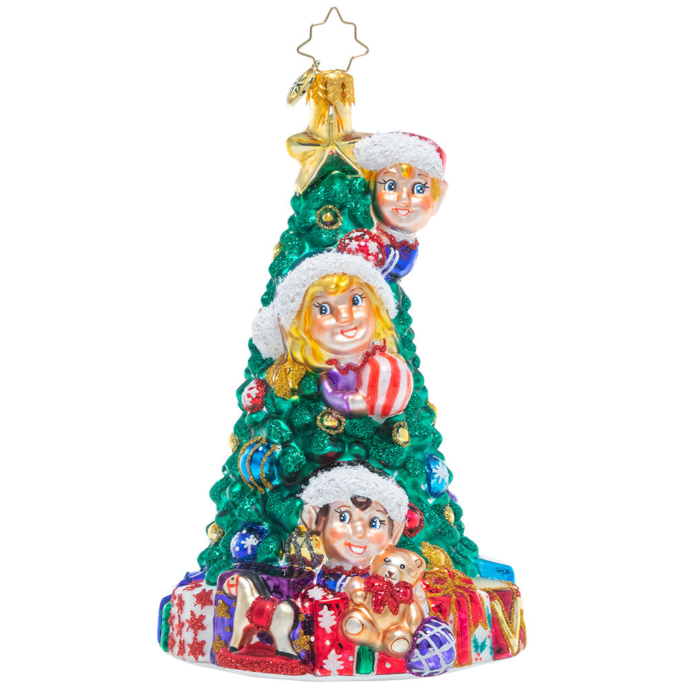 Front - Ornament Description - Three Tree Trimmers: They don't call them Santa's helpers for nothing! These busy elves are hard at work making sure the North Pole workshop tree is trimmed perfectly to Santa's high standards.
