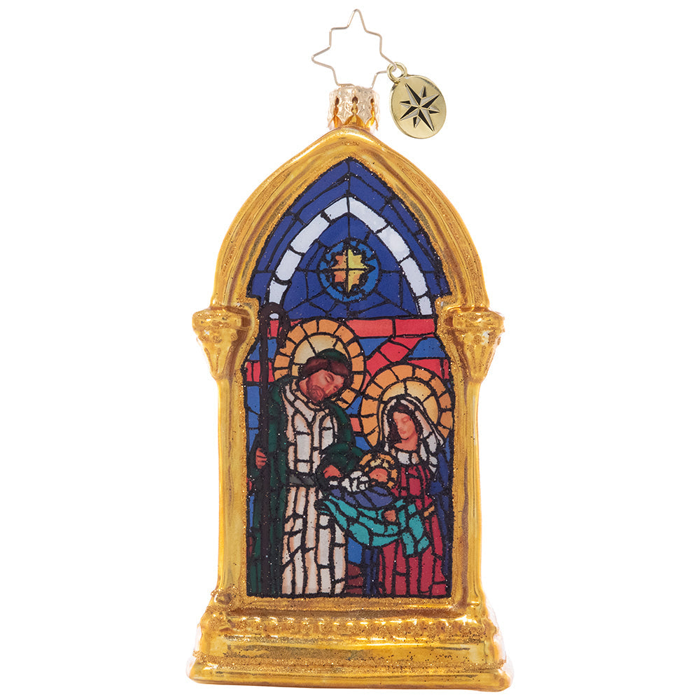 Front - Ornament Description - Silent Night Nativity: All is calm, all is bright. The peaceful glow of a nativity scene and the Christmas star are captured by this stunning stained-glass motif within a gilded frame.
