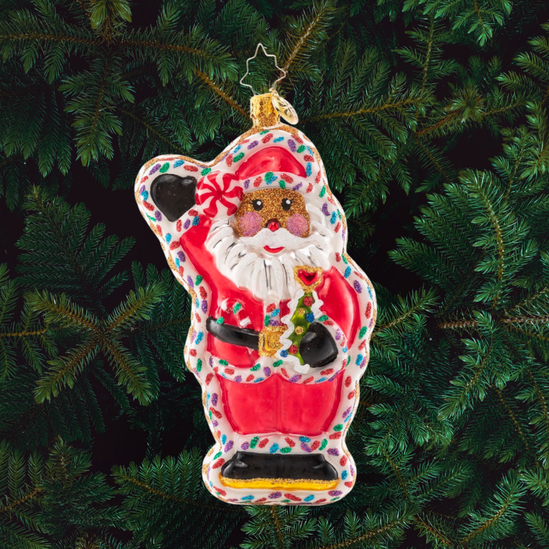 Ornament Description - Cookie Claus: Just when you thought Santa couldn't get any sweeter! This is one tasty treat that has definitely been baked with love--and a pinch of Christmas magic, no doubt!