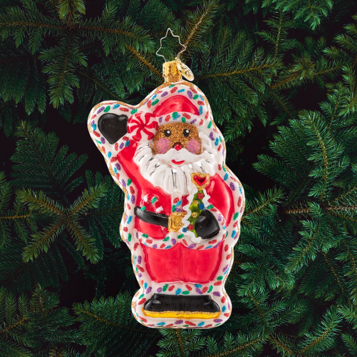 Ornament Description - Cookie Claus: Just when you thought Santa couldn't get any sweeter! This is one tasty treat that has definitely been baked with love--and a pinch of Christmas magic, no doubt!