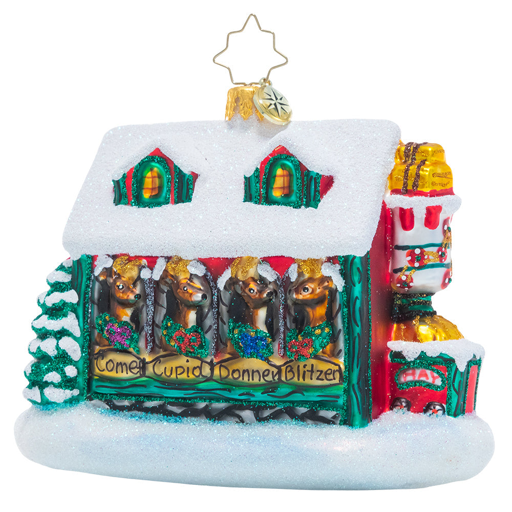 Ornament Description - Santa's Stables: Only the best for Santa's trusted reindeer team! He's made sure his friends live the high life in these cozy Christmas stables.