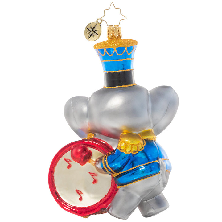 Back - Ornament Description - Keep Good Time: Parum-pum-pum-pum – This adorable elephant drummer boy makes sure the beat goes on! He's looking dapper in his special holiday uniform and feathered cap.