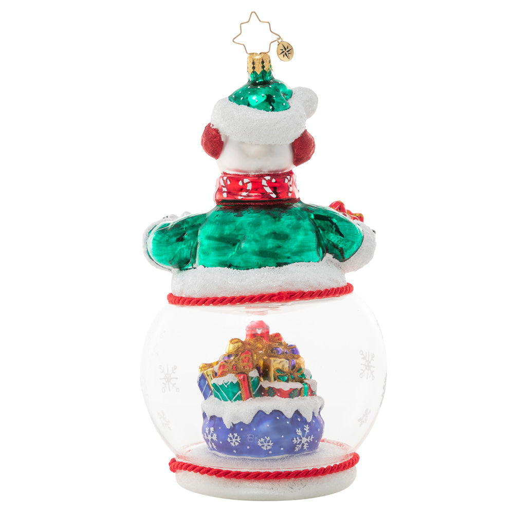 Back - Ornament Description - Chilly and Cheery: This jolly snowman is ready for Christmas! As he proudly shows off his lovingly-wrapped packages, we see there's more where that came from inside his snow globe base!