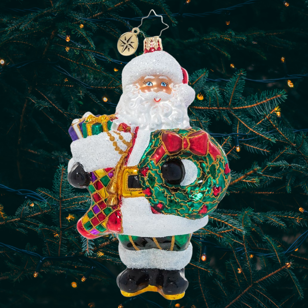 Ornament Description - Christmas Splendor Claus: Fa-la-la-la-la! Armed with a holiday wreath to hang and a Christmas stocking already stuffed full of surprises, Santa is ready to deck the halls.