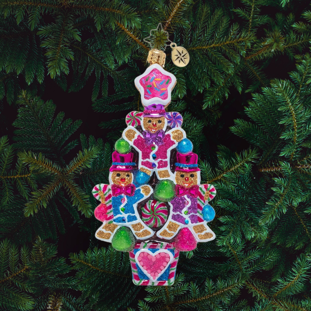Ornament Description - The Sweetest Treats: Treats on treats! These little gingerbread fellows have stacked themselves up in a jewel-toned festive formation – a sweet cookie Christmas tree!