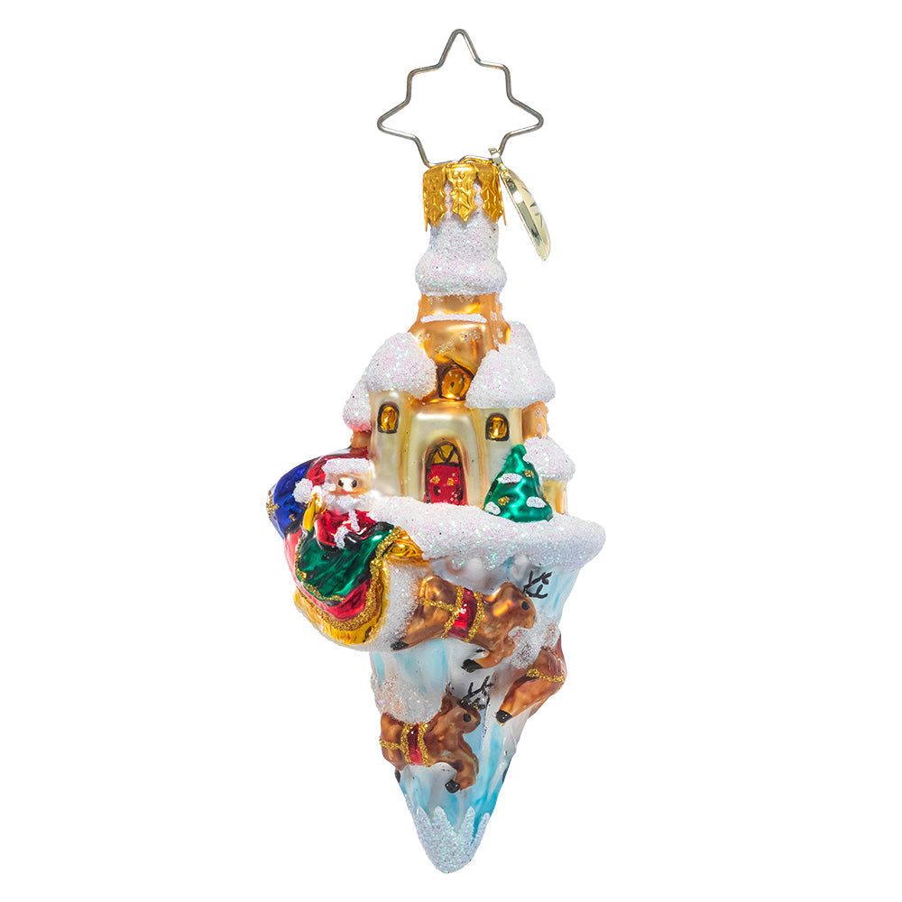 Front - Ornament Description - Paradise On Ice Gem: North Pole on ice! This detailed little ornament shows off all of the best parts of the North Pole; Saint Nick and his sleigh, flying reindeer, the warm glow of Santa's workshop, and of course lots of snowy scenery.
