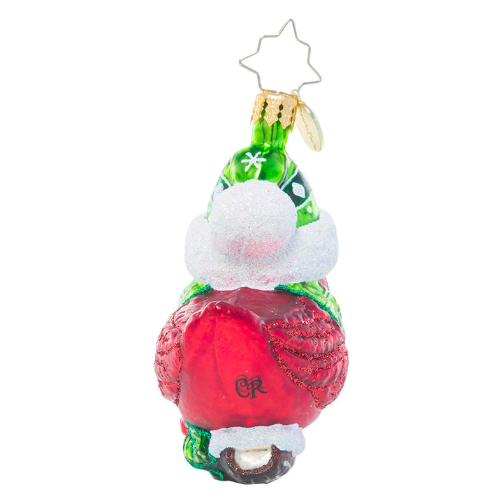 Back - Ornament Description - Bundled-Up Feathered Freind Gem: This little birdie forgot to fly south for the winter, so he's bundling up extra warm for the holiday season! With his ruby-red feathers and bright green scarf and hat, he looks right at home in Christmas town.