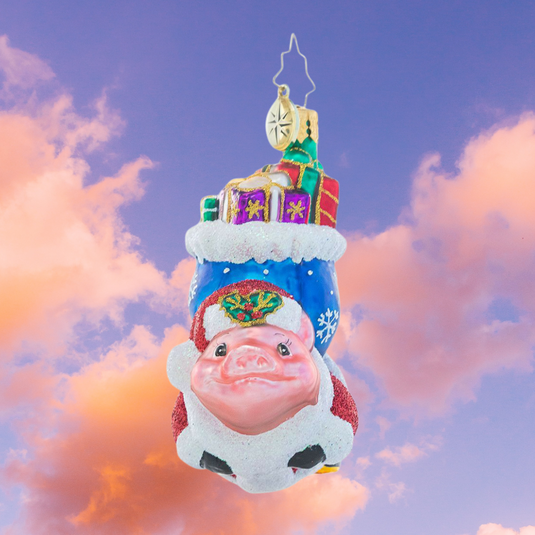 Ornament Description - When Pigs Fly Gem: Up, up, and away! This flying pig ornament proves that anything is possible with a little Christmas magic!