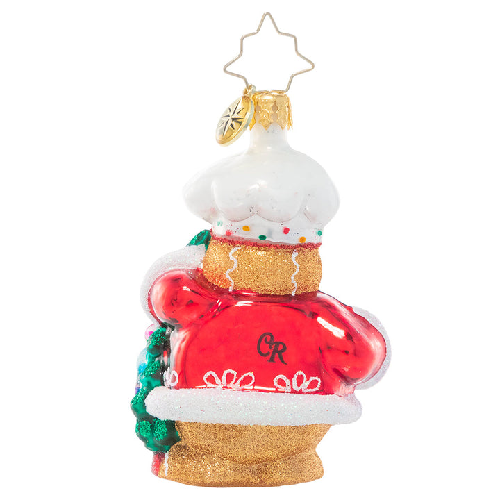 Back - Ornament Description - Edible Evergreen Dream Gem: This smiling gingerbread baker has whipped up a batch of his specialty – Christmas candy ornaments for his tree! He can't wait to celebrate his favorite season with all his gingerbread friends!