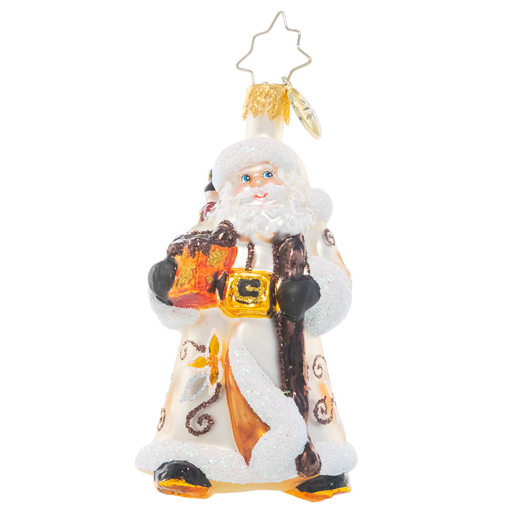 Front - Ornament Description - Bountiful Basket Traveler Gem: Dressed in wintry white and carrying a basket of sundries, Santa looks ready for a long trek. It's a snowy one out there, but luckily he's an expert North Pole navigator!