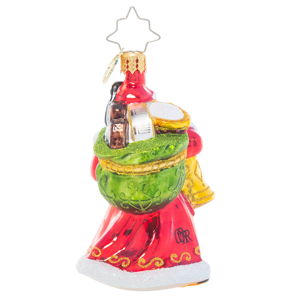 Back - Ornament Description - A Christmas Melody Gem: Can you hear the sounds of Christmas? With a sack of instruments slung over his shoulder and bells in hand, Santa has everything he needs to be his own one-man Christmas band!