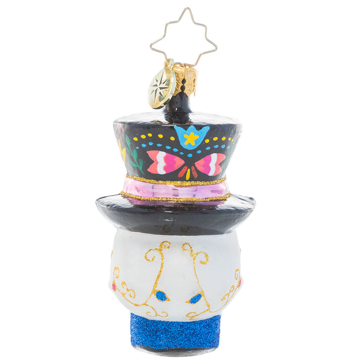 Back - Ornament Description - One Dapper Calavera Gem: This sugar skull ornament is truly head-turning! With a top hat, bold colors and intricate detailing, this calavera looks ready for his big night.