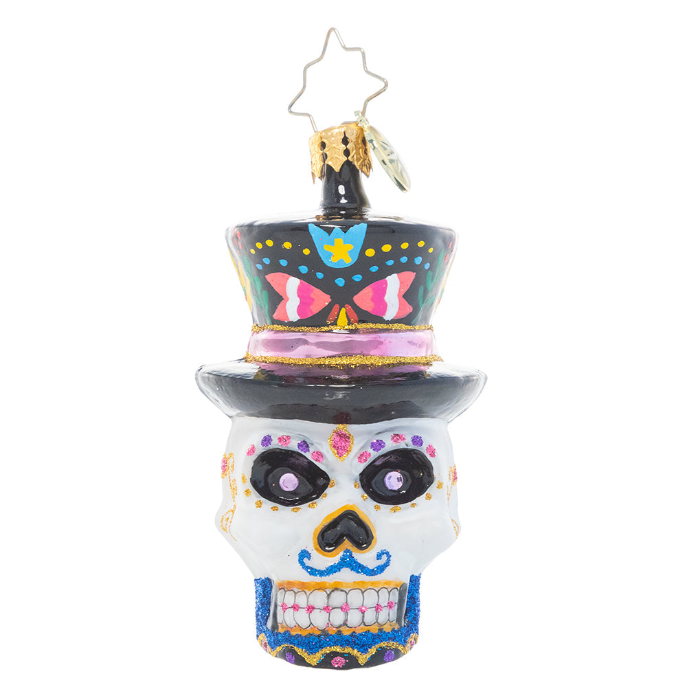 Front - Ornament Description - One Dapper Calavera Gem: This sugar skull ornament is truly head-turning! With a top hat, bold colors and intricate detailing, this calavera looks ready for his big night.