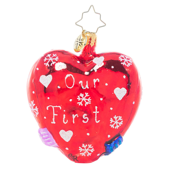 Back - Ornament Description - A Frosty First Christmas: A first Christmas together makes the season extra special. Mark this important milestone with this adorable heart-shaped ornament celebrating new love!