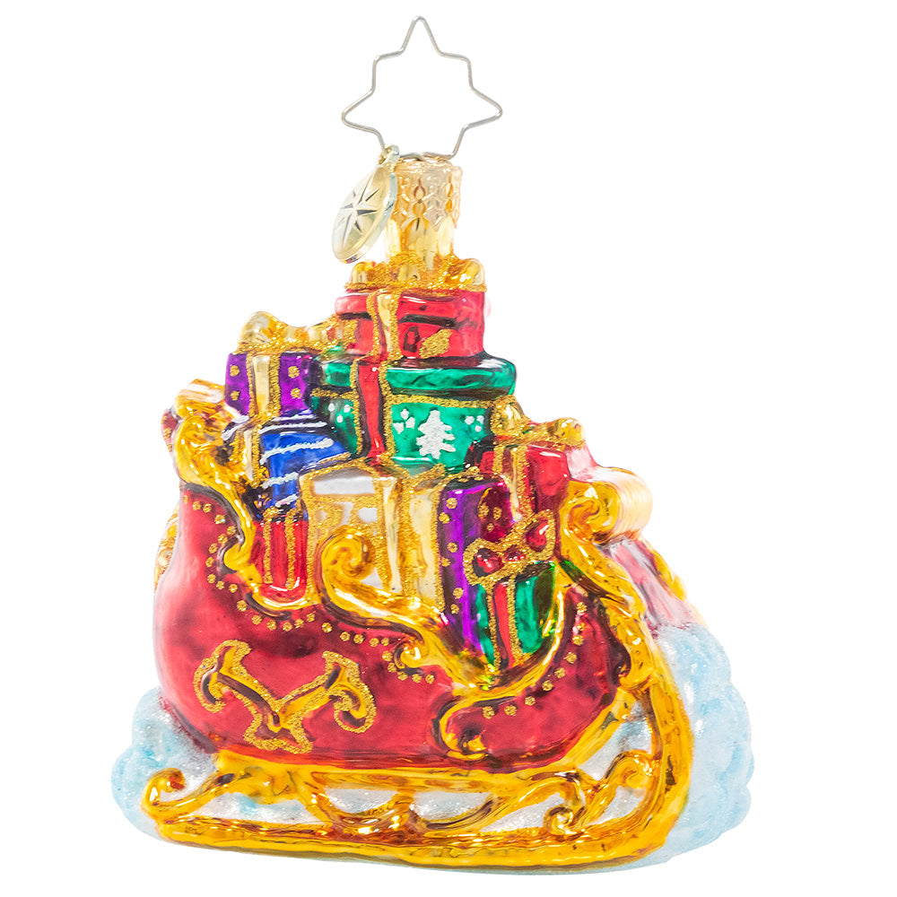 Front - Ornament Description - Regally Radiant Sleigh Gem: Santa's sleigh is packed to the brim with Christmas gifts for good girls and boys. Here's hoping we're on the nice list!