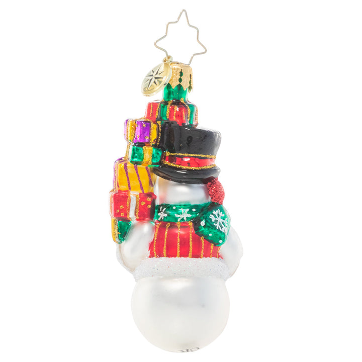 Back - Ornament Description - Savvy Shopper Gem: This snowman takes Christmas shopping very seriously! He's spent his day finding just the right gifts for everyone on his list – time to return home to put them under the tree!