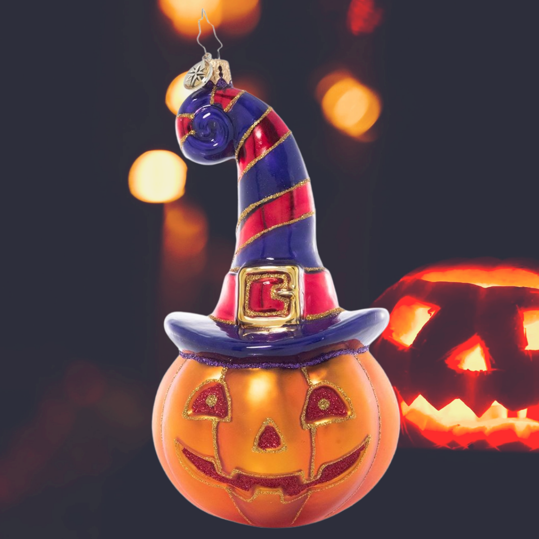 Ornament Description - Bewitching Jack-o-Lantern: Boo! This Jack-O-Lantern is getting into the spirit of spooky season, grinning from beneath the brim of his favorite witchy hat.