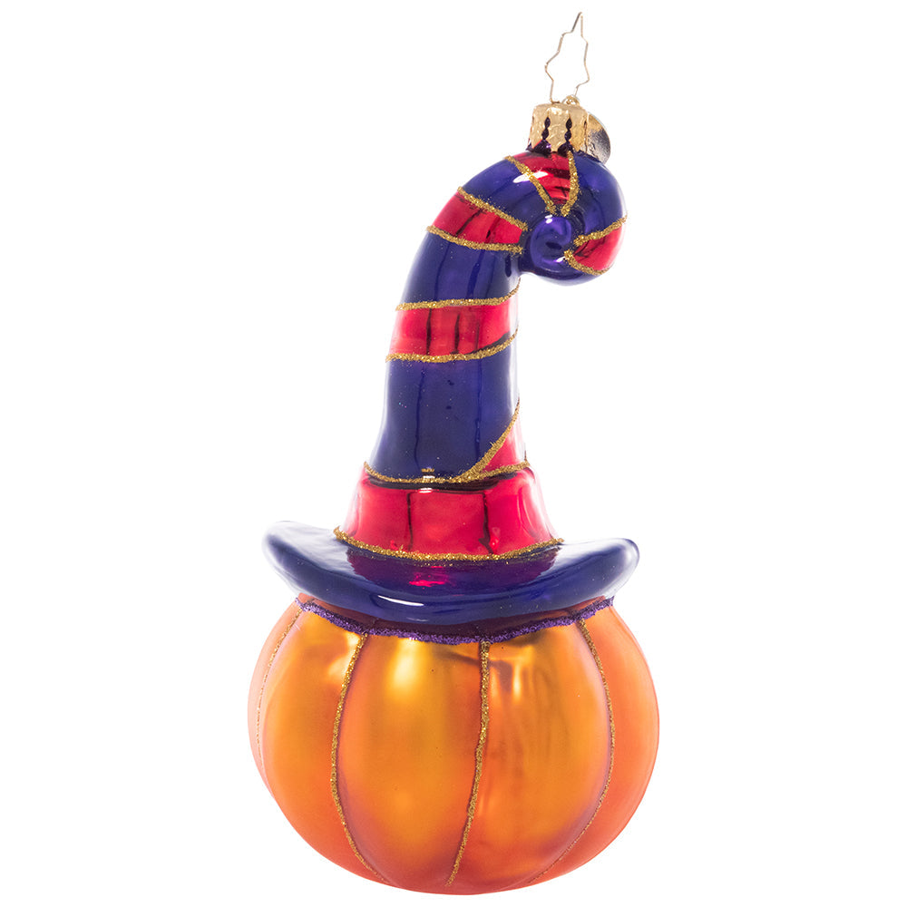 Back - Ornament Description - Bewitching Jack-o-Lantern: Boo! This Jack-O-Lantern is getting into the spirit of spooky season, grinning from beneath the brim of his favorite witchy hat.