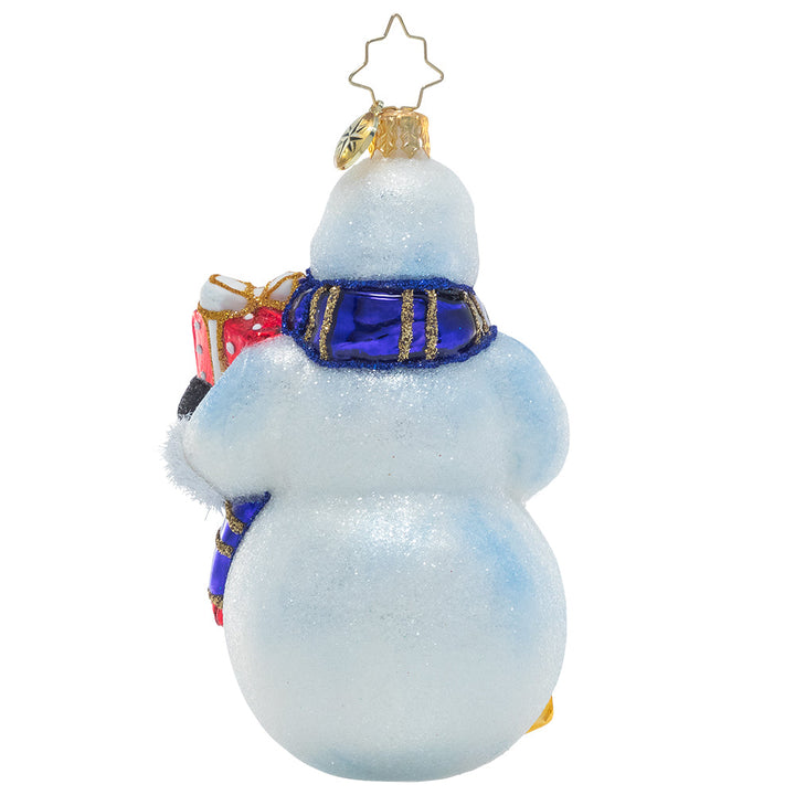 Back - Ornament Description - Smiling Snow Friend: This happy snowman has taken off his top hat and filled it with presents. What kind of merry-making will he get up to once he delivers them?
