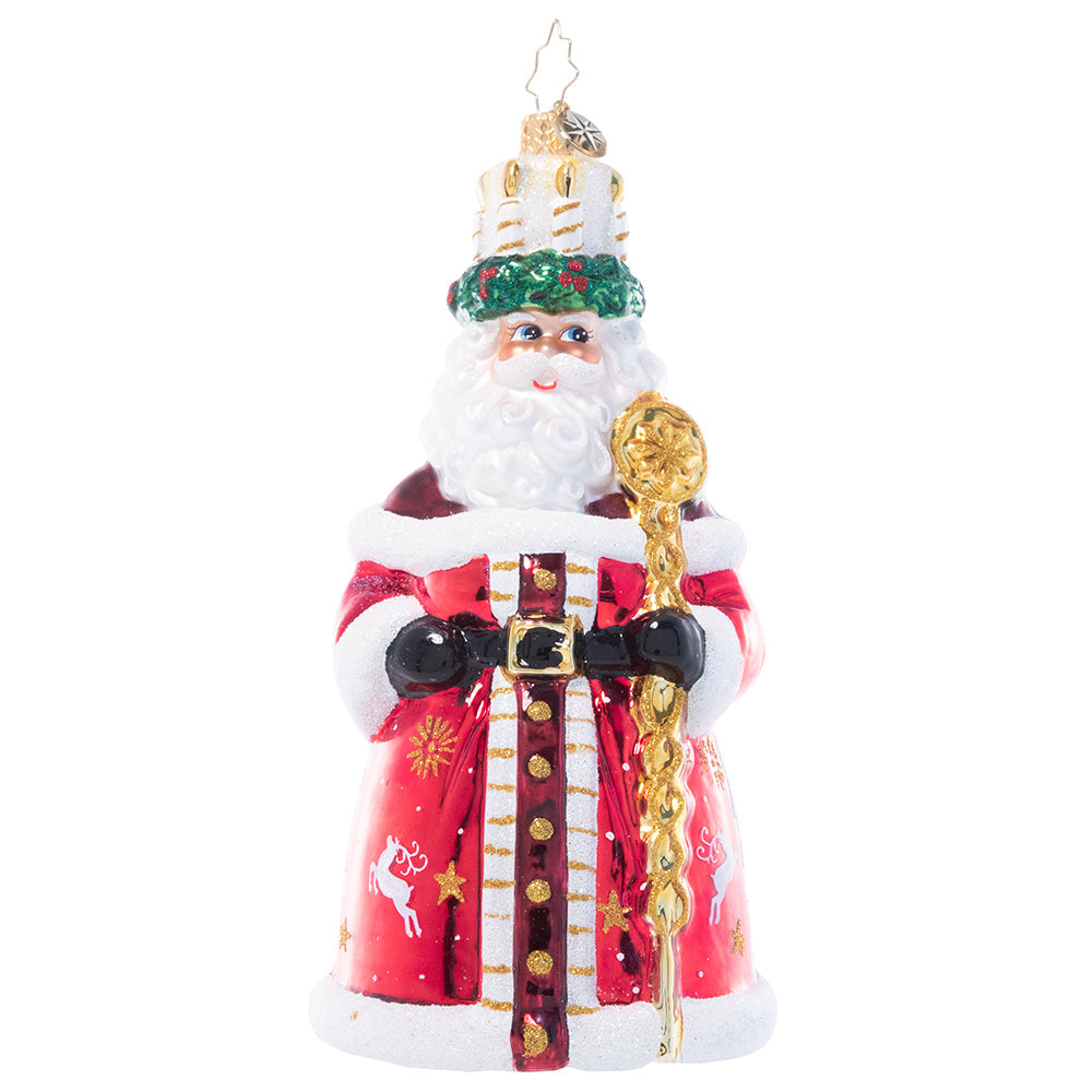 Front - Ornament Description - God Jul Santa: This Santa wears a crown of candles and a shiny red robe adorned with a delicate white pattern reminiscent of traditional Nordic Christmas motifs, paying homage to the Scandinavian feast of Santa Lucia.