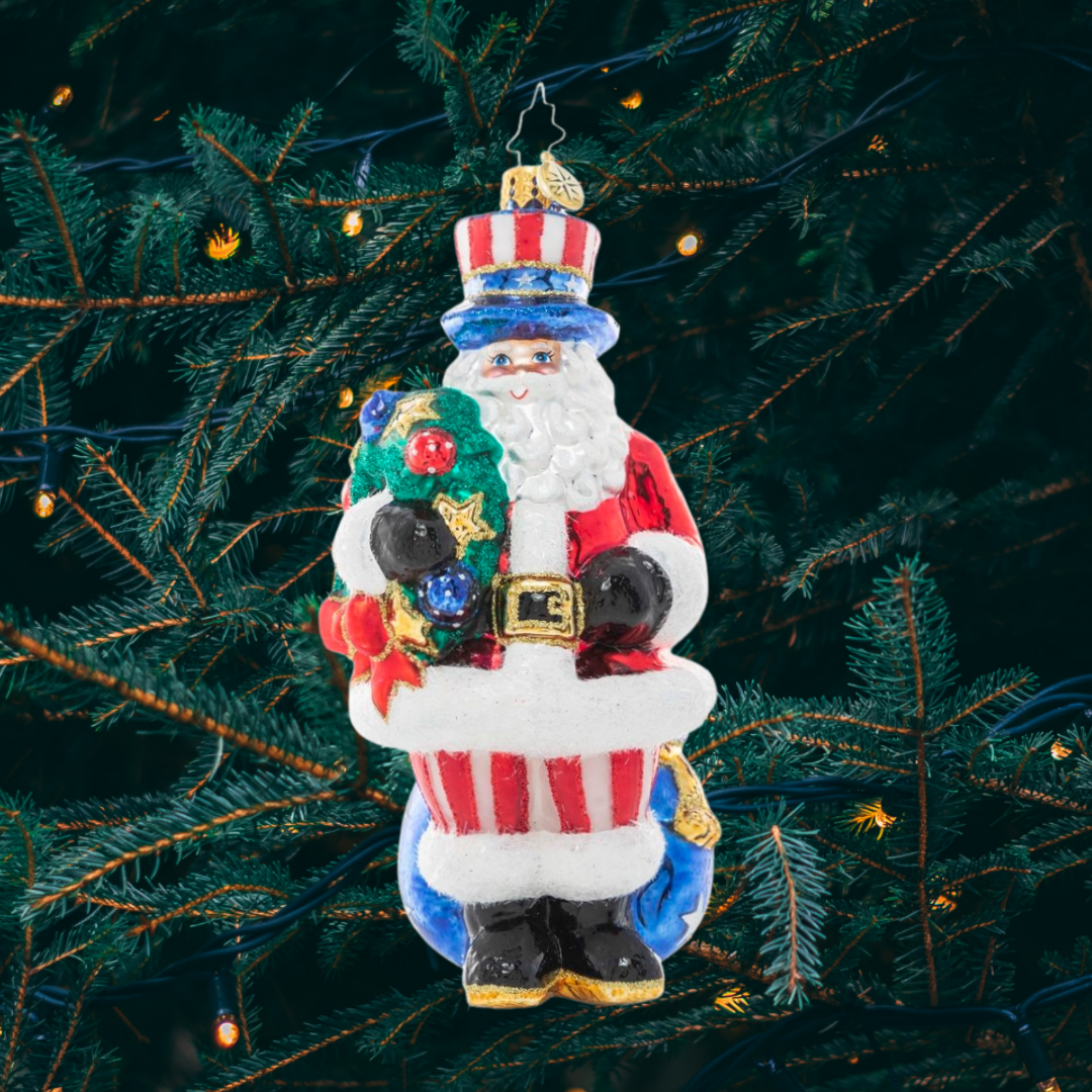 Ornament Description - Proud Patriot Santa: Star spangled Santa! Santa stands proud in his stars and stripes, showing his love for the land of the free and the home of the brave.