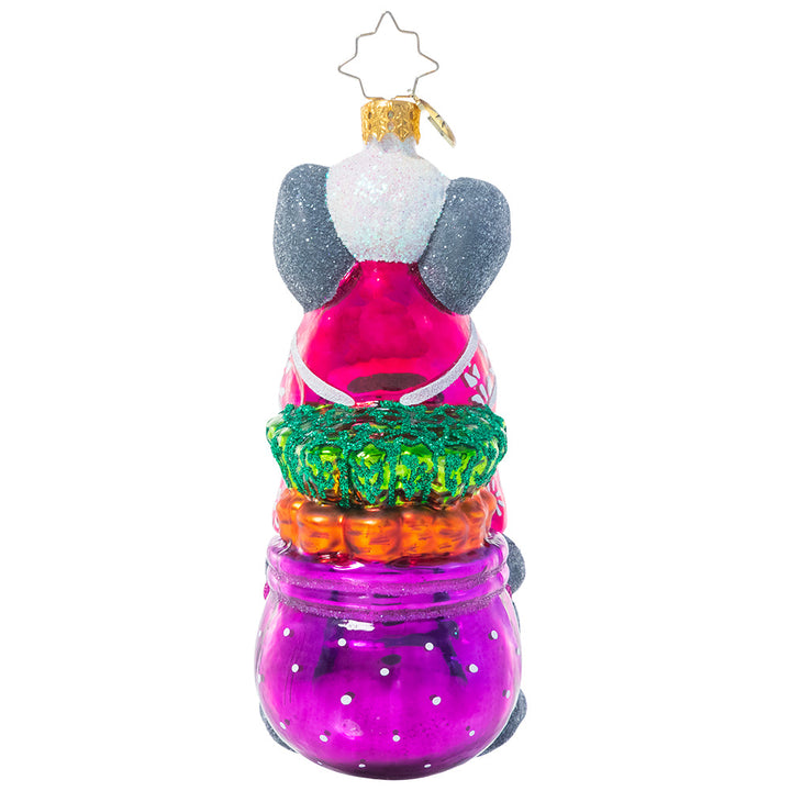 Back - Ornament Description - Bundled Up Bunny: This little cotton tail looks ready to hit the slopes with his snow hat and a bag full of provisions from the garden. All he needs now are some skis!