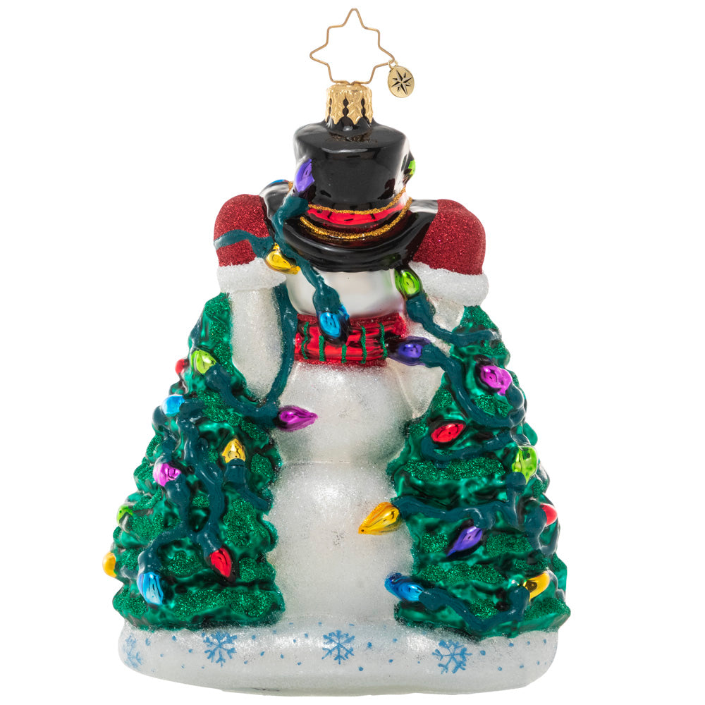 Ornaments - Description: Frosty has been wrestling with his Christmas lights all day long, and he's at last down to hanging his final strand. He's glad you're here to admire his holiday handiwork!
