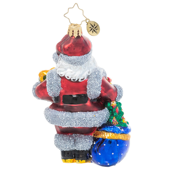 Back - Ornament Description - Shimmering With Surprises: Who needs tinsel? Santa's puttin' on the glitz with the twinkling silver trim on his plush red suit. With an outfit like this, he sparkles as bright as any Christmas tree!