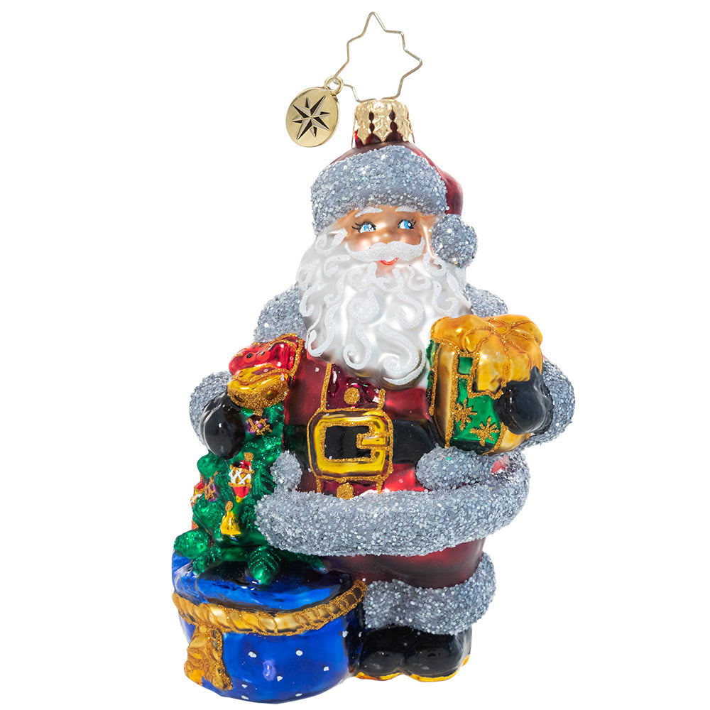 Ornament Description - Shimmering With Surprises: Who needs tinsel? Santa's puttin' on the glitz with the twinkling silver trim on his plush red suit. With an outfit like this, he sparkles as bright as any Christmas tree!