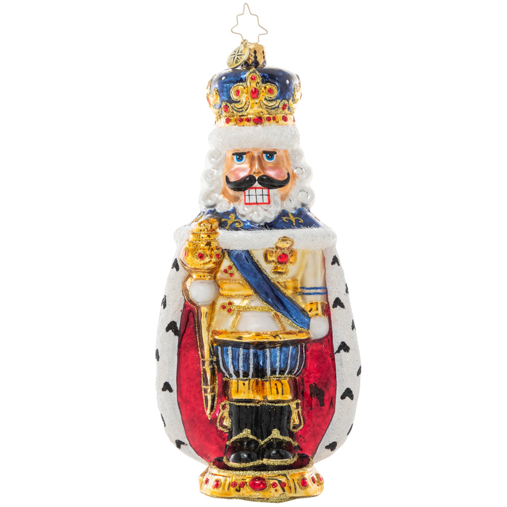 Front - Ornament Description - Nutcracking Royalty: Get the holiday season cracking this year with this jolly royal nutcracker. From behind, his regal robe wraps around his feet giving him a shape reminiscent of a nut himself!