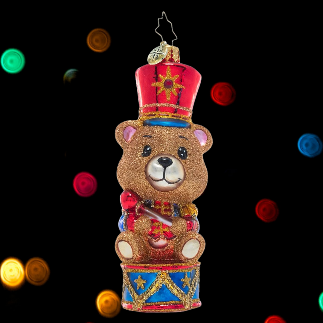 Ornament Description - Tiny Teddy Drummer Boy: A-rum-pum-pum-pum! This adorable little drummer bear sits upon his drum, ready to play his way into your heart.