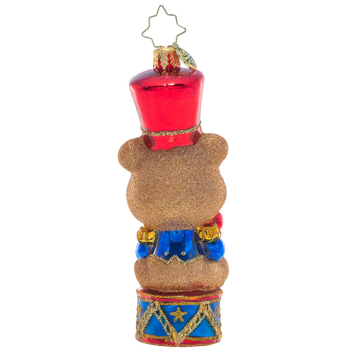 Back - Ornament Description - Tiny Teddy Drummer Boy: A-rum-pum-pum-pum! This adorable little drummer bear sits upon his drum, ready to play his way into your heart.