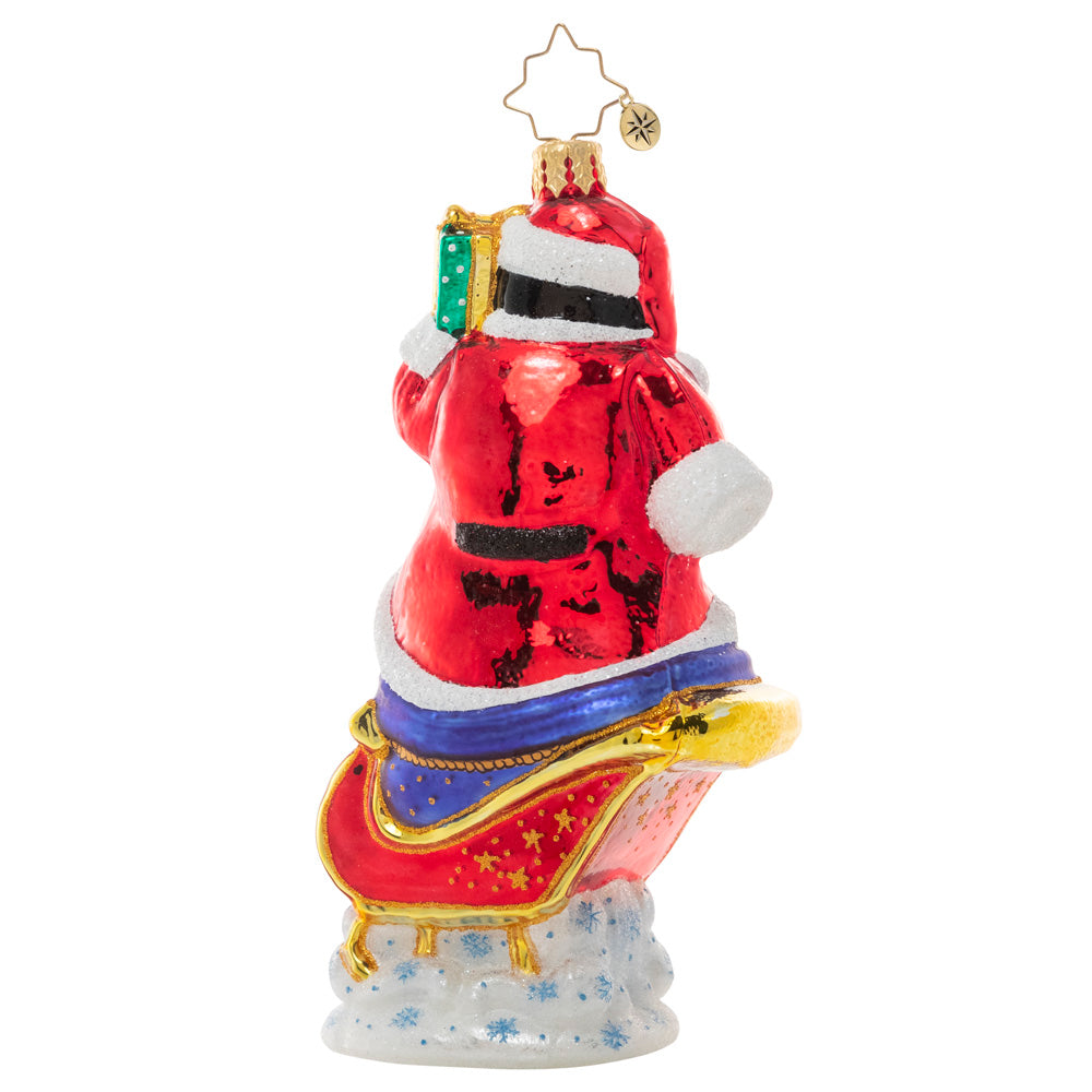 Back - Ornament Description - Silliest Sleigh Ride: A pair of polar pals is up to their tricks again, playing a little dress-up as they load Santa's sleigh for round-the-world deliveries. Good thing Santa has a sense of humor!