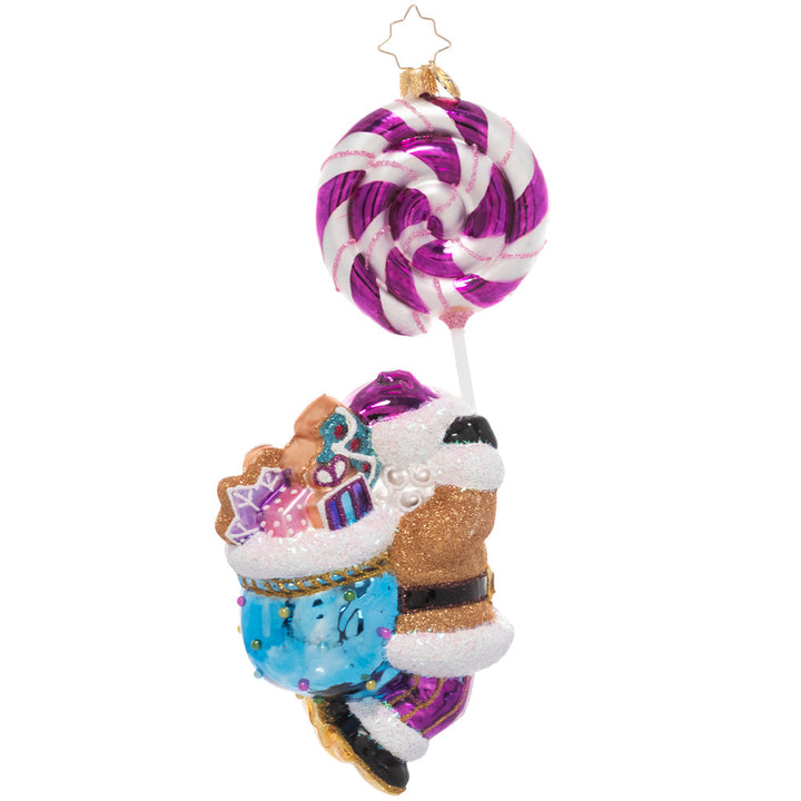 Back - Ornament Description - Lolli Jolly Christmas: May your holiday be extra sweet this year! Santa dangles from a twirly, swirly purple lollipop on his way to deliver a sack full of goodies.