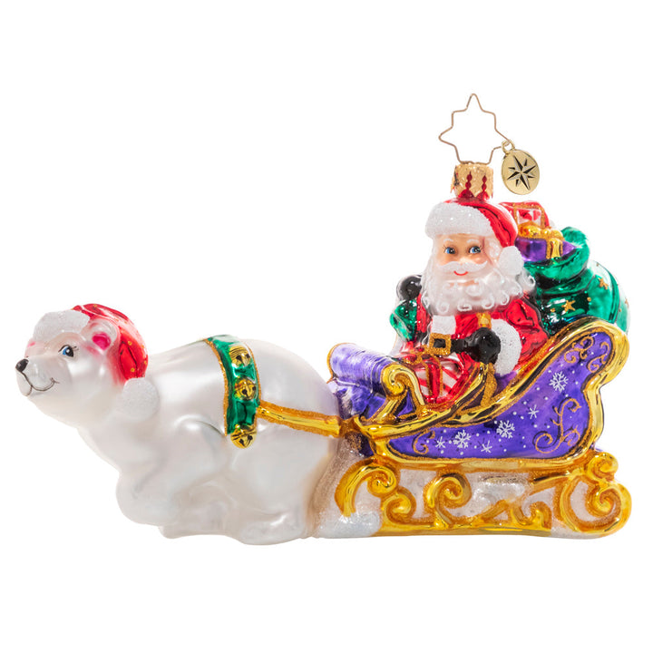 Front - Ornament Description - Polar Bear Powered: Tally ho! Santa has given his reindeer the day off, hitching his magic sleigh to a friendly polar bear for a joy ride in the snow.