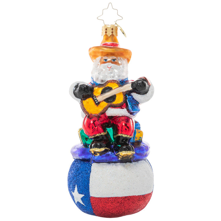 Front - Ornament Description - Pride of Texas Santa: Ho-ho-Howdy Partner! Santa shows his love for the state of Texas, donning his cowboy best and plucking along on his guitar atop a Texas-sized sack of gifts especially for all the good boys & girls in the Lonestar State!