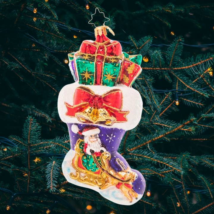 Ornament Description - Night Before Christmas Stocking: And what a night it was! This classic overstuffed stocking ornament showcases a snowy Christmas Eve vignette.