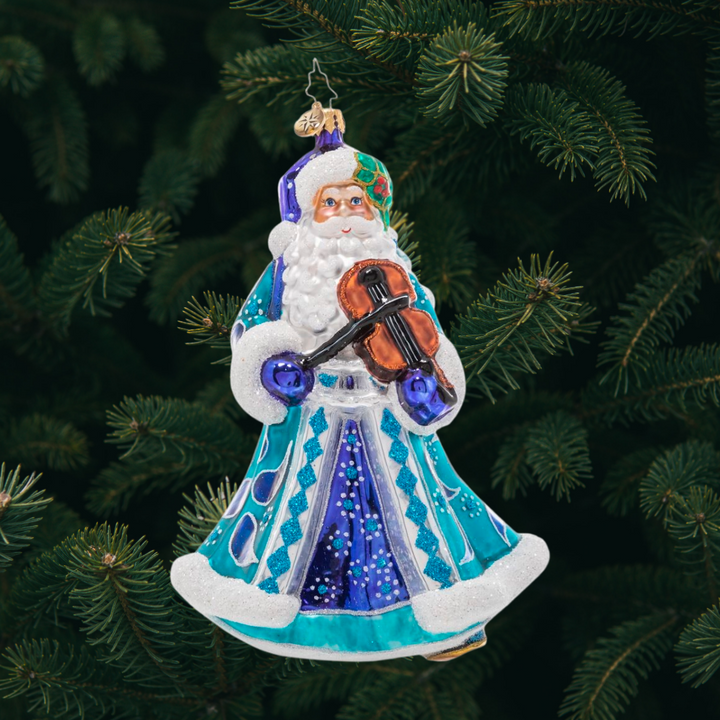 Ornament Description - Fancy Fiddler Santa: Play us a tune, Santa! This luxurious traditional Claus is dressed to the nines in cool greens and blues, ready to serenade you with a sweet holiday tune on his violin. 