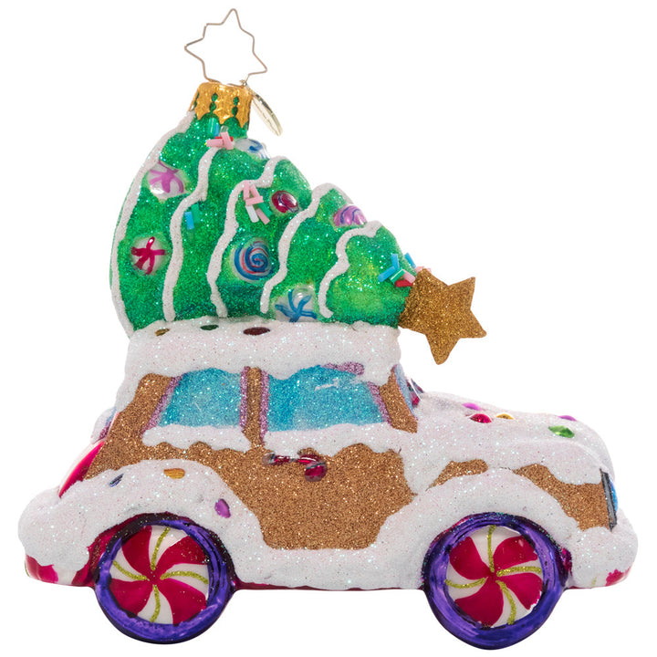 Back - Ornament Description - Candy Tree Delivery: Over the river and through the woods…someone has driven this cookie car far and wide to find the perfect candy Christmas tree! It looks like they picked one that will be just right to brighten up their cozy gingerbread house.