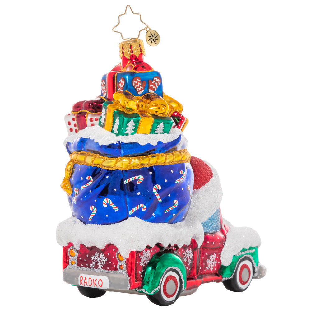 Back - Ornament Description - Happy Haul-idays: Looks like someone has been on the nice list this year! Stacked high with special gifts for loved ones, this cheery Christmas truck is looking ready for the season of giving.