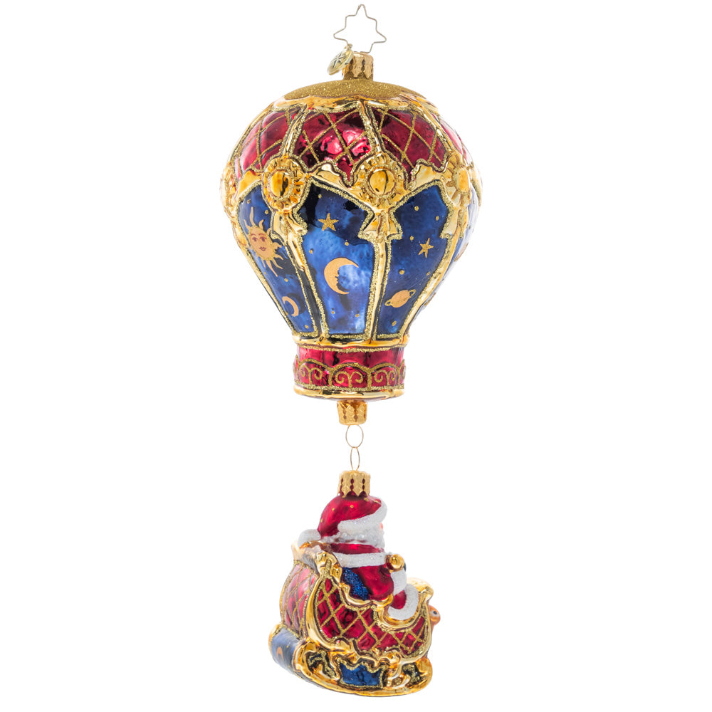 Back - Ornament Description - Among the Stars: Up, up, and away! Santa and his golden sleigh float gracefully through the night sky with the help of a celestial hot air balloon.